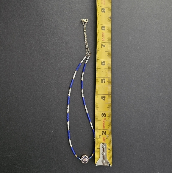 Charming beaded necklace with gold plated chain and charming daisy bead Handmade - Picture 3 of 3